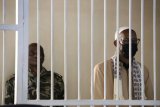 Nairobi court finds 2 men guilty of aiding al-Shabab militants in 2019 hotel attack