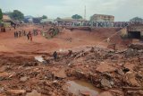 At least 151 killed after flash floods submerge Nigerian town