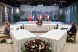 Turkish, Italian, Libyan leaders meet to address migration and Libya's stability