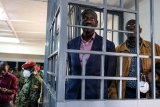 Ugandan lawmakers pass bill to try civilians before military courts, defying concern and criticism