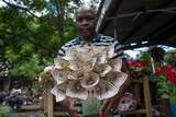 In Zimbabwe, cash bouquets and scrap metal gifts rival flowers as coveted Valentine's tokens of love