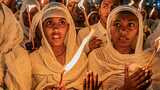 Ethiopians gather for Orthodox Christmas Eve candlelight ceremony
